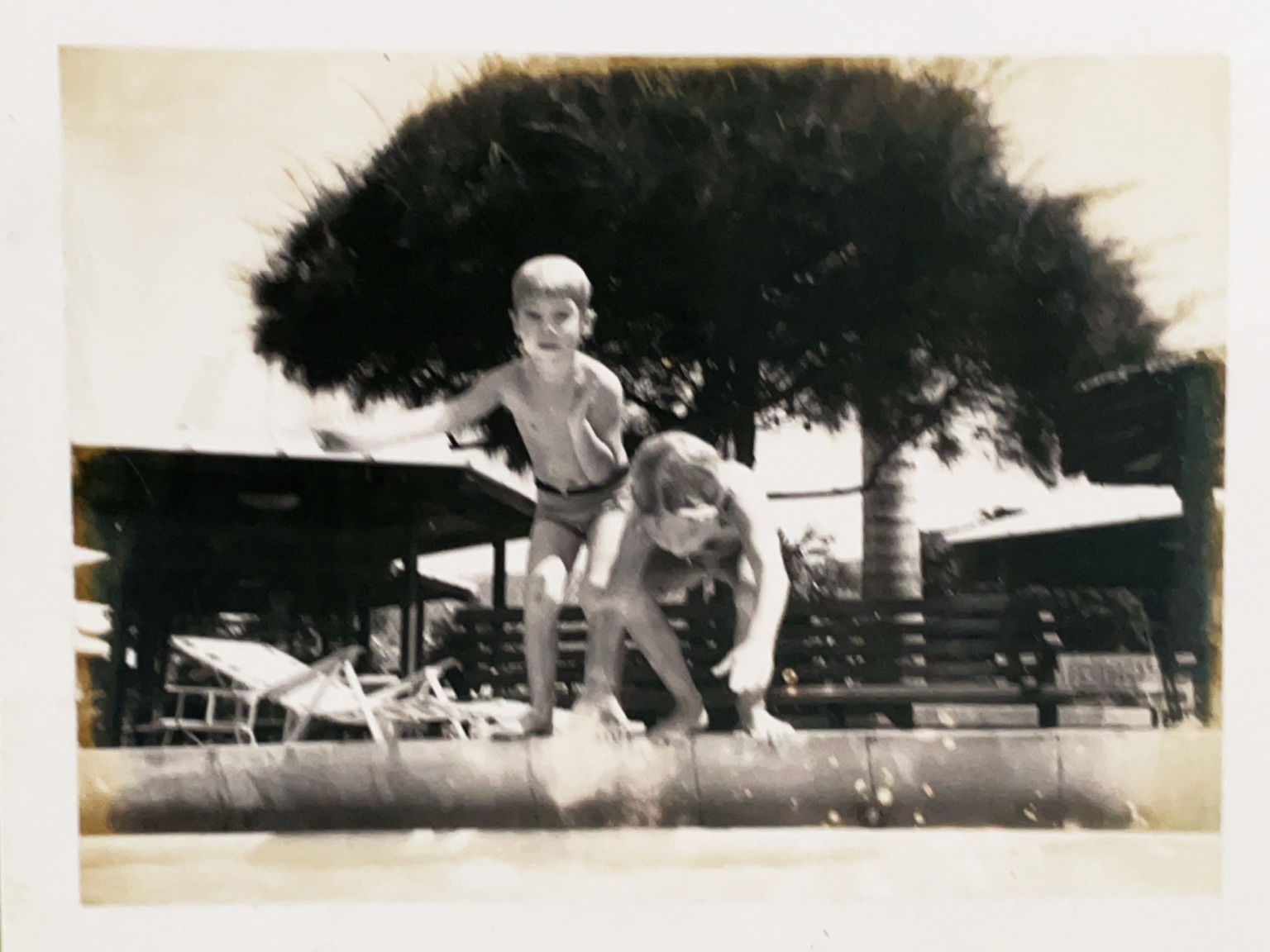 Original children by a pool
